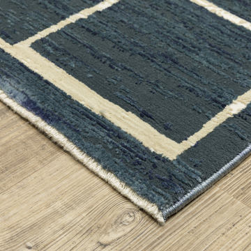Reed Blue/Ivory 5′3″ X 7′6″ Area Rug