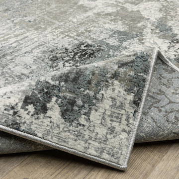 Gemini Blue/Beige 9′10″ x 12′10″ Area Rug