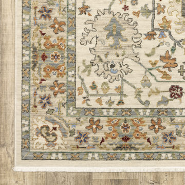 Lucca Ivory/Multi 6′7″ x 9′6″ Area Rug