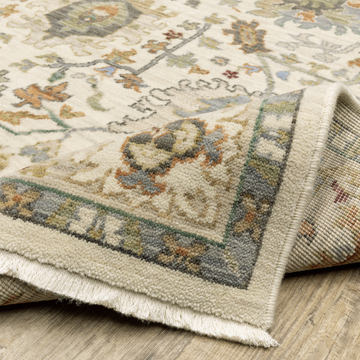 Lucca Ivory/Multi 6′7″ x 9′6″ Area Rug