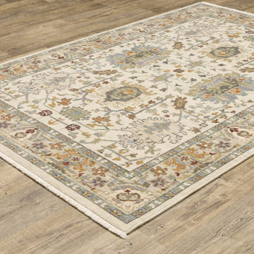 Lucca Ivory/Multi 6′7″ x 9′6″ Area Rug