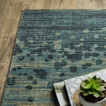 Reed Earth Tone/Multi 5′3″ X 7′6″ Area Rug