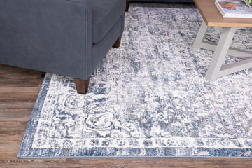Theory Ivory/Blue Area Rug - 7′10″ X 10′10″