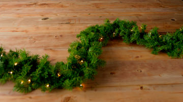 Continental 9′ Pre-Lit Artificial Pine Garland With Clear Lights