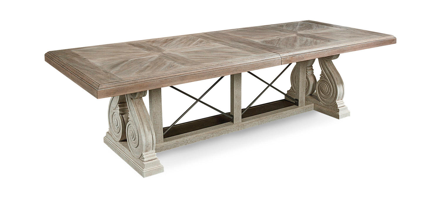The Salvage Dining Table features a sun bleached elm veneer top and a pedes...